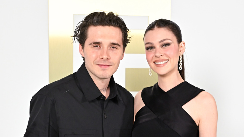 Brooklyn Beckham and Nicola Peltz smiling in September 2024