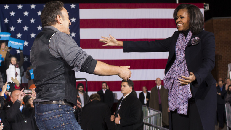 Bruce Springsteen and Michelle Obama about to hug