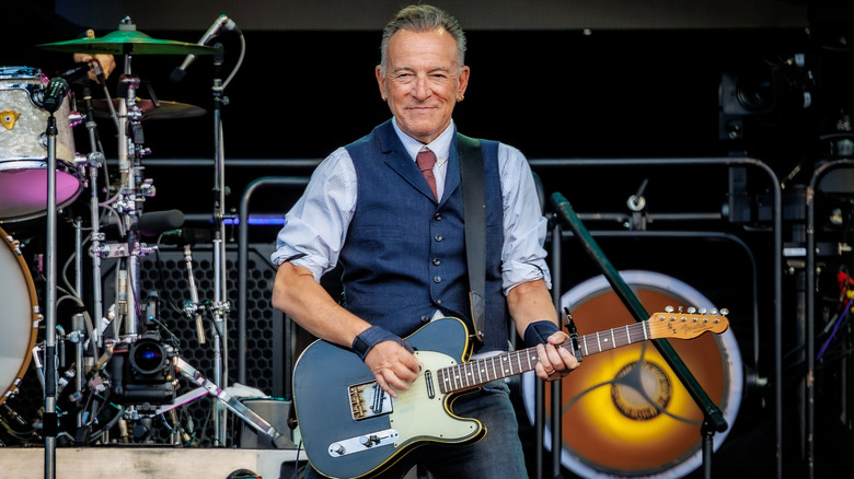 Bruce Springsteen playing the guitar