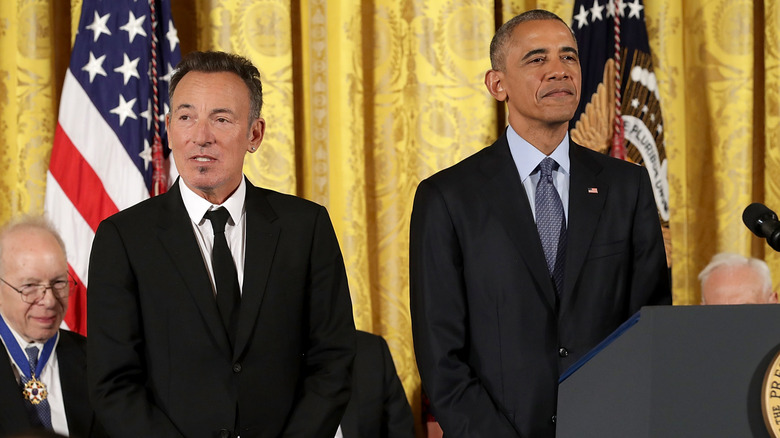 Bruce Springsteen standing beside Barack Obama