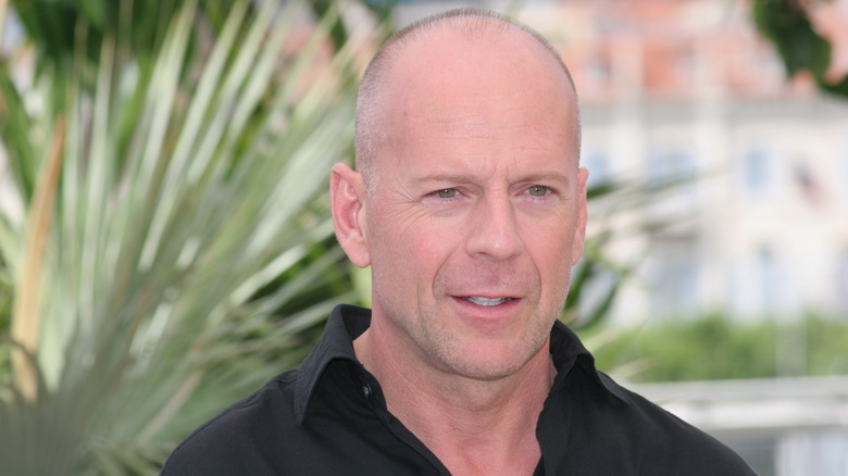 Bruce Willis wearing black shirt