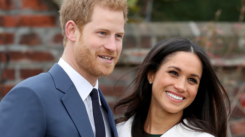 Meghan Markle and Prince Harry smiling