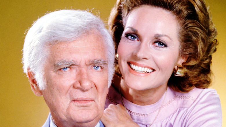 Lee Meriwether smiling with her hand on Buddy Ebsen's shoulder.