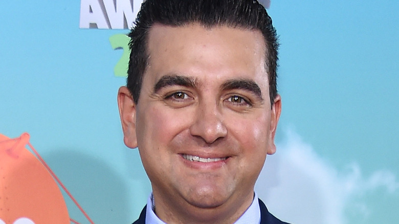 Buddy Valastro poses with a smile