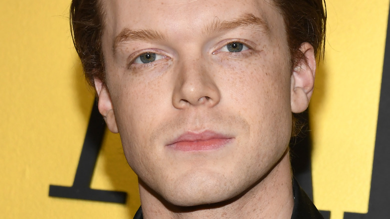 Cameron Monaghan posing for press