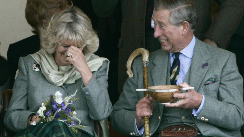 Queen Camilla and King Charles III laughing together