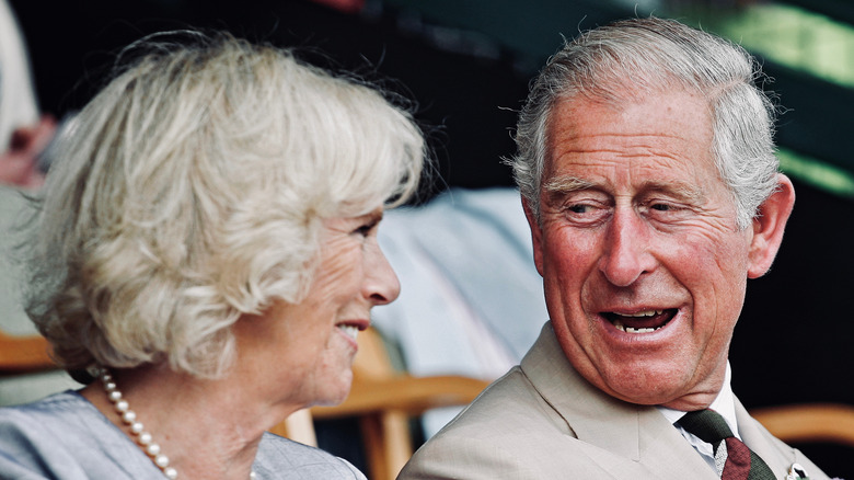 Prince Charles and Camilla Parker Bowles talking