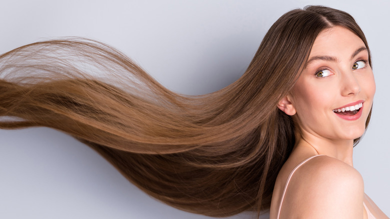 Woman with long silky smooth hair 