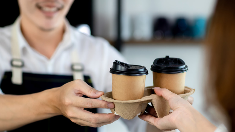 barista giving guest an order