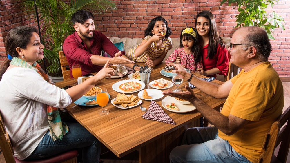Family eating in restaurant