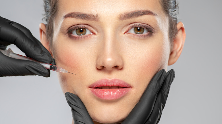 woman getting botox injection