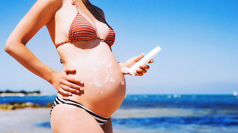 Pregnant woman at beach