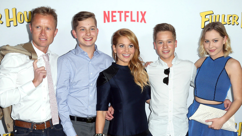 Candace Cameron Bure and her family on the red carpet.