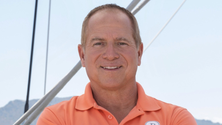 Captain Glenn smiling on boat