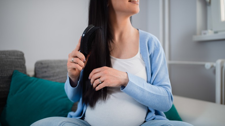 Pregnant woman with long hair