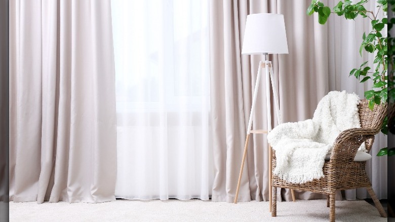 A living room with curtains