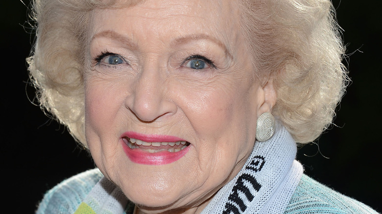 Betty White smiles for a photo. 