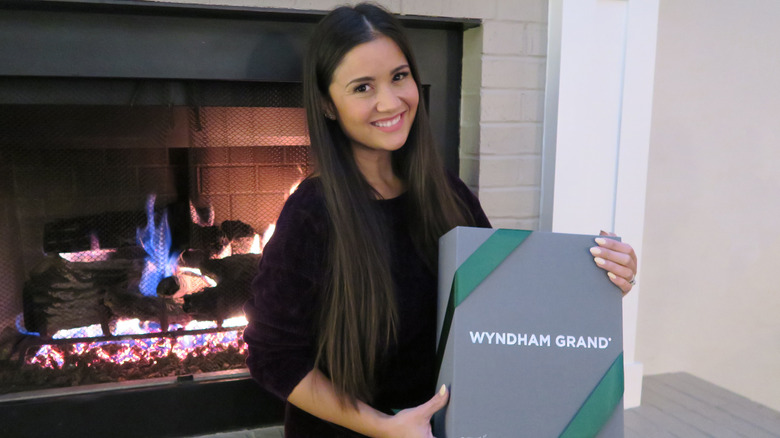 Catherine Lowe holding Wyndham Grand box