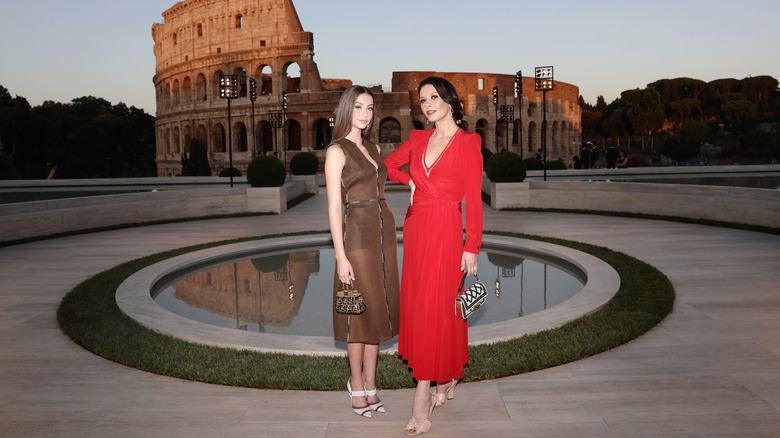 Carys Zeta Douglas and Catherine Zeta-Jones pose in front of the Colosseum.