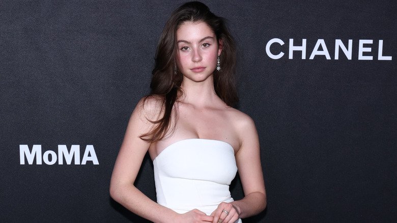 Carys Zeta Douglas wears a strapless white dress.