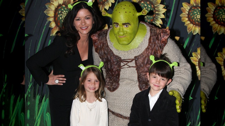 Catherine Zeta-Jones, Dylan Michael Douglas, and Carys Zeta Douglas pose with Brian d'Arcy James in character as Shrek.