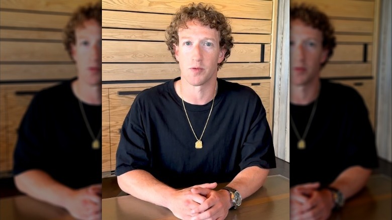 Mark Zuckerberg wearing a gold chain and black T-shirt