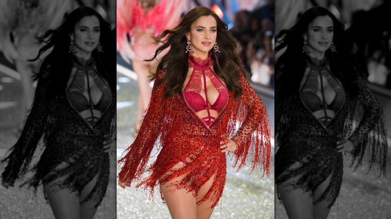 Irina Shayk walking the ramp in red lingerie while pregnant