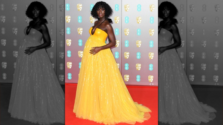 Jodie Turner-Smith in a yellow pregnancy gown at BAFTAs
