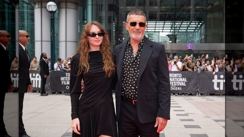 Stella Banderas and Antonio Banderas smile together