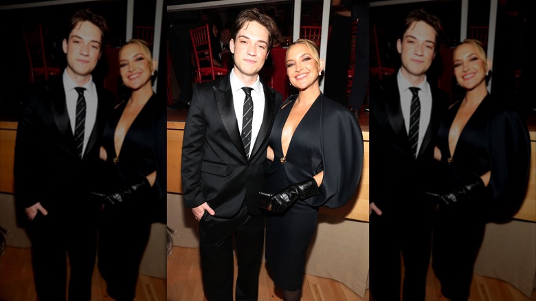 Ryder Robinson and Kate Hudson smile together on the red carpet