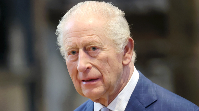 Closeup of a pale King Charles III