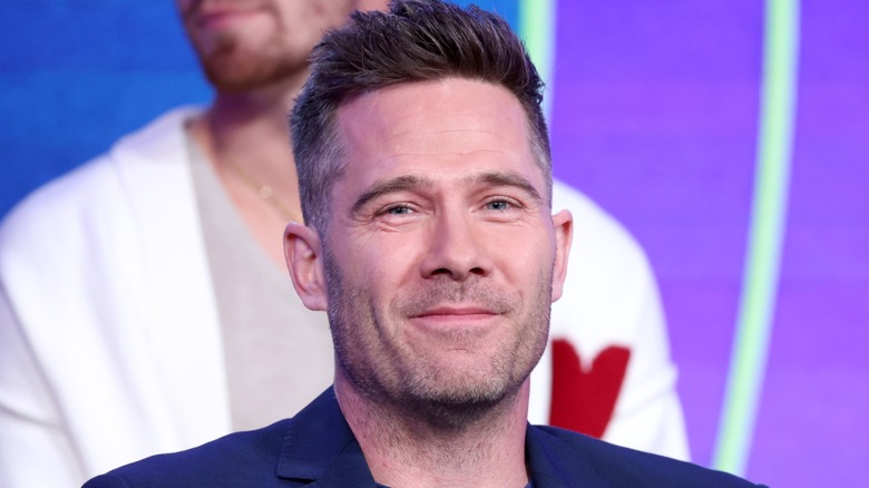 Luke Macfarlane smiling