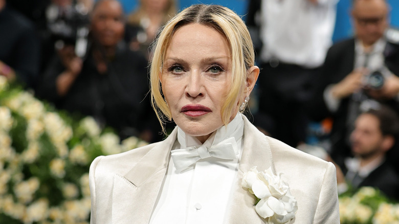 Madonna wearing a suit