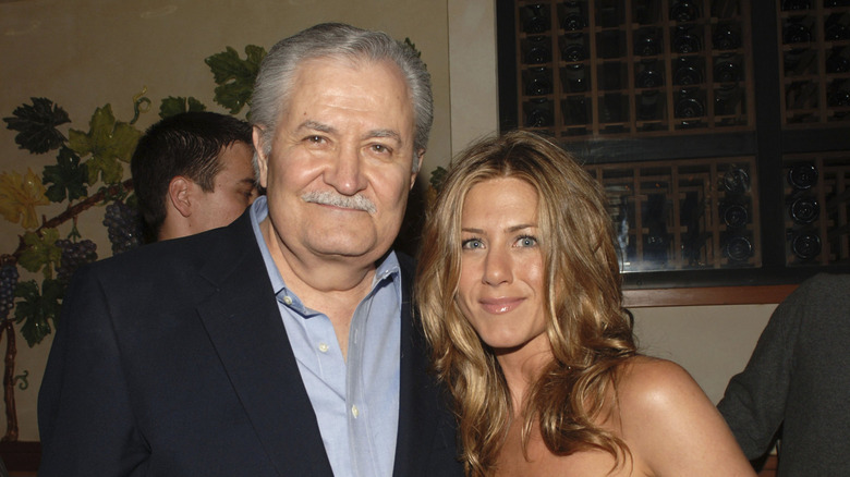 John Aniston with daughter Jennifer Aniston at a party