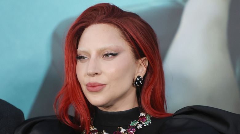 Lady Gaga with red hair at movie premiere