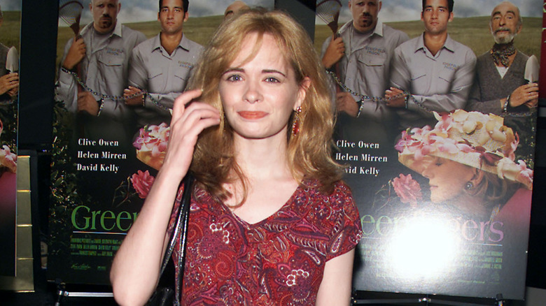 Adrienne Shelly in a red paisley dress at film premiere
