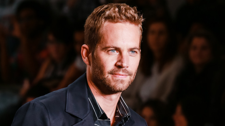 Paul Walker posing at event