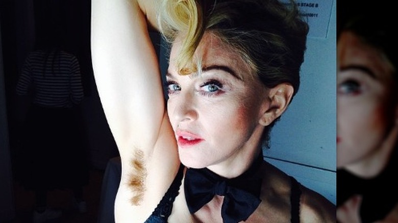 Madonna showing underarm boby hair