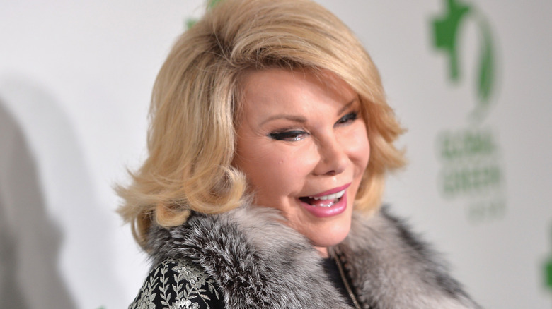 Joan Rivers laughing on the red carpet
