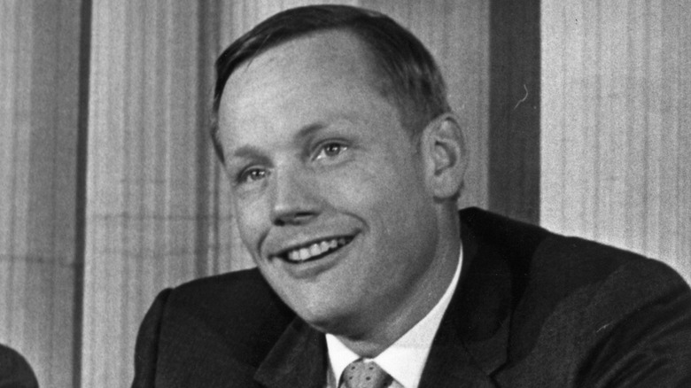 Neil Armstrong talks at a press conference