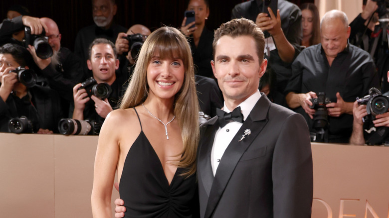 Alison Brie and Dave Franco twinning in black at the Golden Globes