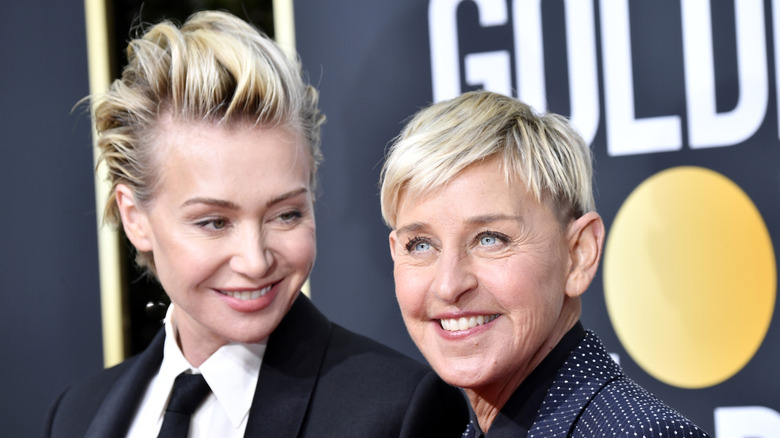 Portia de Rossi looking at Ellen DeGeneres with a smile