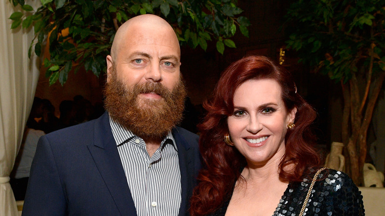 Nick Offerman in a bushy beard beside his wife Megan Mullally