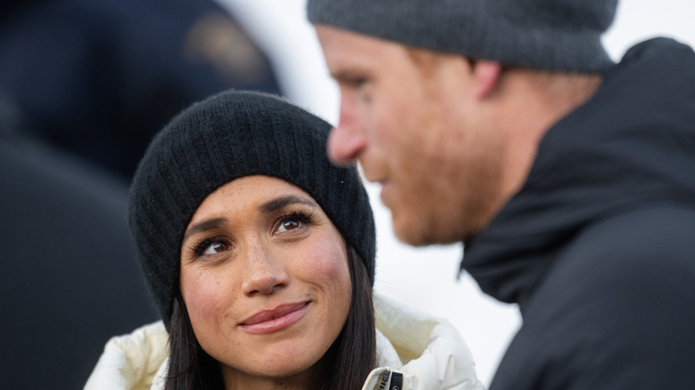Meghan Markle smiling at Prince Harry
