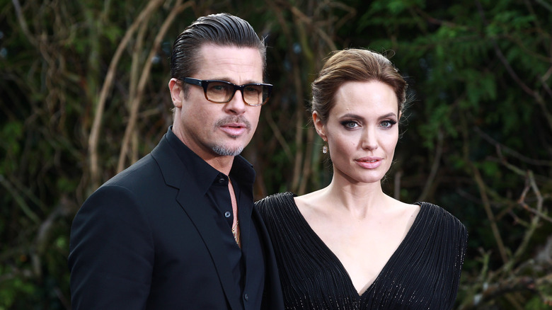 Angelina Jolie and Brad Pitt in black formals