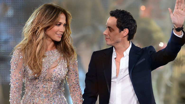 Jennifer Lopez and Marc Anthony looking at each other