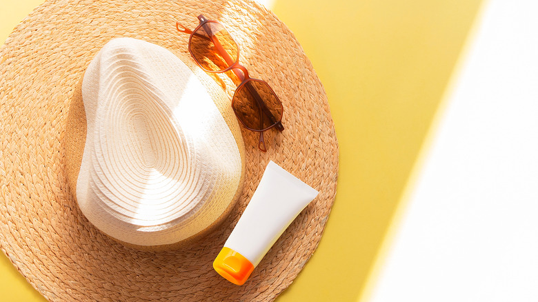 Sun hat, sunglasses, and sunscreen