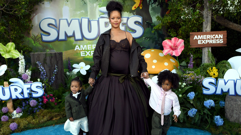 Riot Mayers, Rihanna, and RZA Mayers attending a "Smurfs" premiere