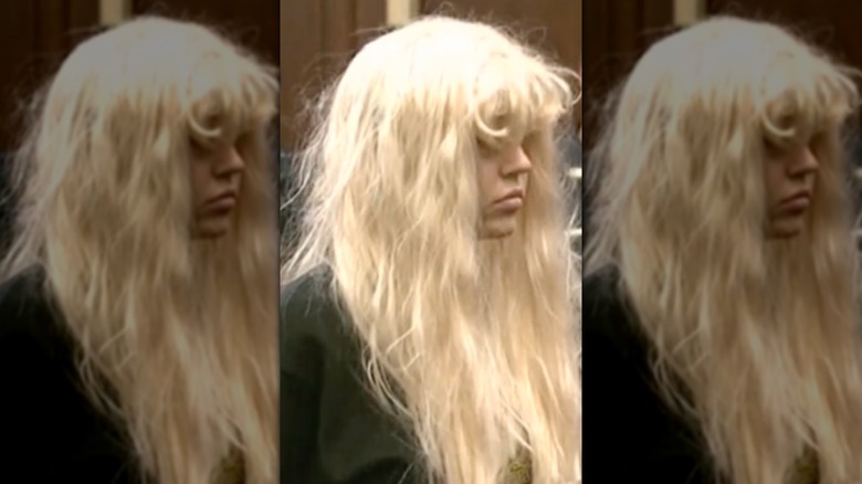 Side profile Amanda Bynes in court in 2013 wearing blond wig covering most of her face