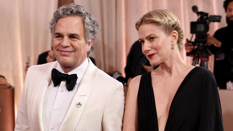 image of Mark Ruffalo and Sunrise Coigney smiling on the Golden Globes red carpet